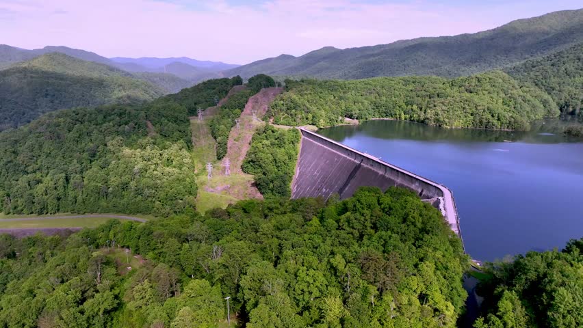 aerial push in to fontana dam, hydroelectric dam, tallest dam in eastern united states