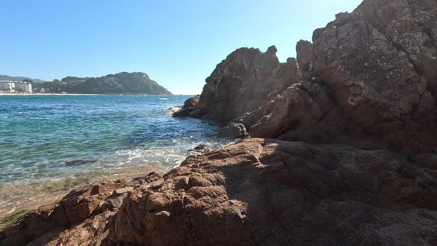 Walking on the rocks in Lloret de Mar.