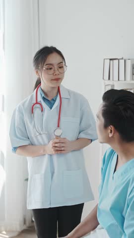Doctor talking to patient and filling patient history, examination, treatment, medical and health concept.