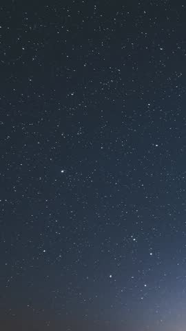 Vertical Timelapse of Stars Background in Starry Night Sky
