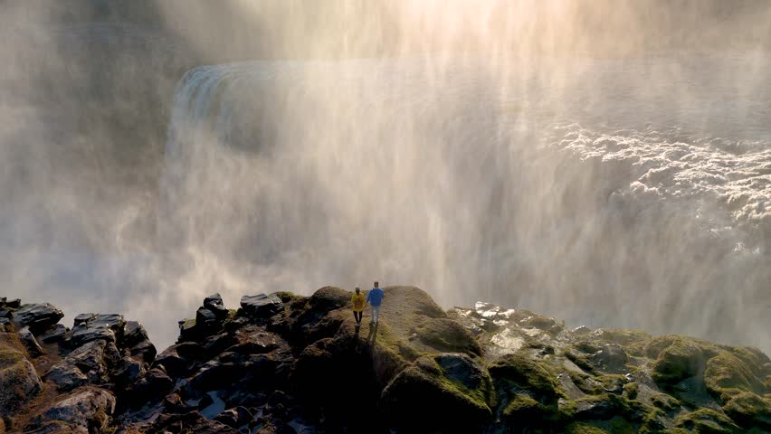 Experience the breathtaking beauty of Dettifoss waterfall Iceland, plunging dramatically in Icelands rugged terrain.