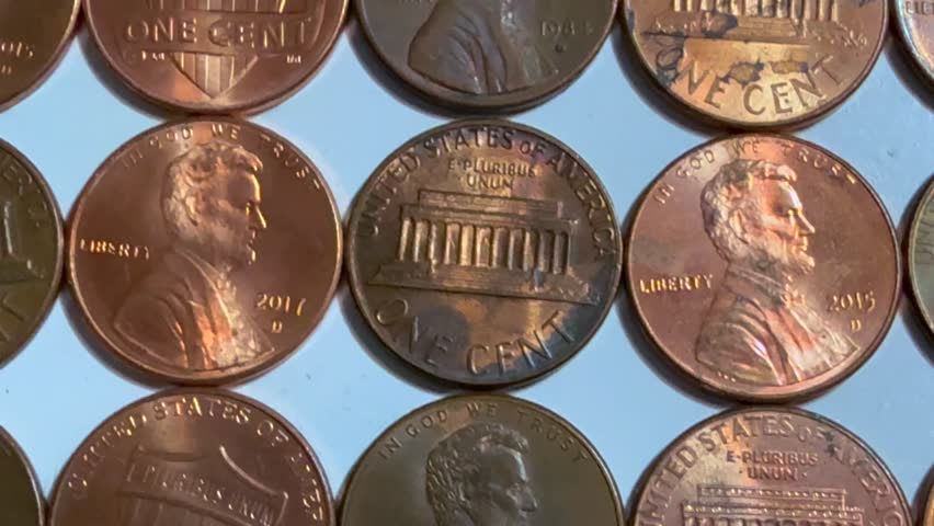 Concept Illustrating US Penny Nicely Arranged - One Cent Value American Coin Currency