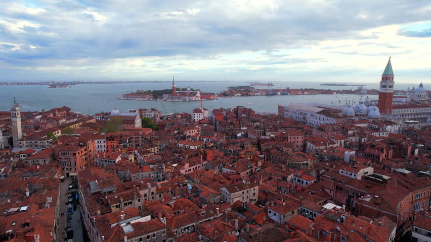 Venetian landmarks and San Giorgio Maggiore island in background. Aerial
