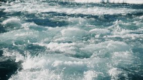 The breathtaking and mesmerizing view of turbulent waves, characterized by dynamic patterns and frothy foam in rivers or oceans, truly showcases natures incredible energy and unmatched beauty - Powered by Shutterstock - Get 15% off with code: PIKWIZARD15