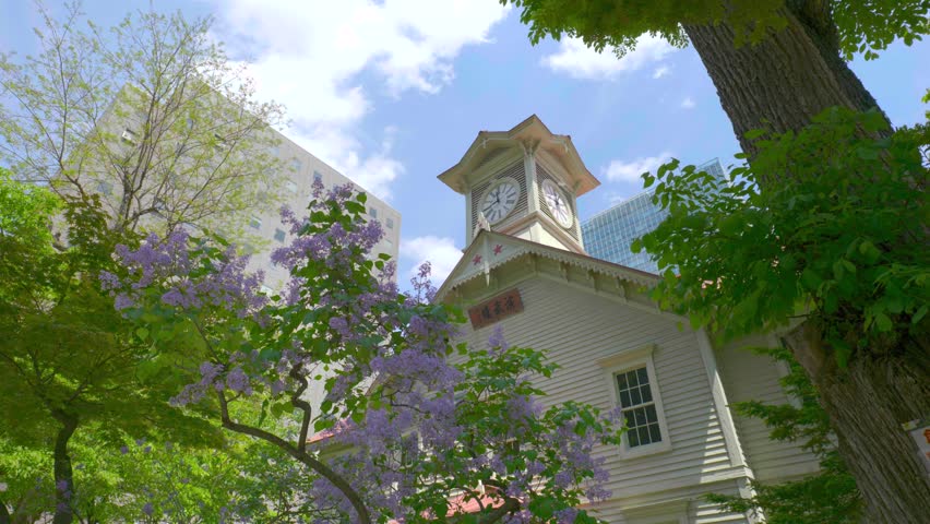 Sapporo Clock Tower with Lilac Flowers in Spring, Hokkaido, Japan
Translation: Drill Hall Signboard