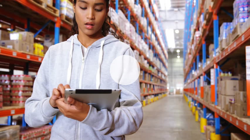 warehouse worker tapping tablet activating network overlay while colleagues verifying stock levels. Inventory, logistics, technology, collaboration, industrial, digital, data - Powered by Shutterstock - Get 15% off with code: PIKWIZARD15