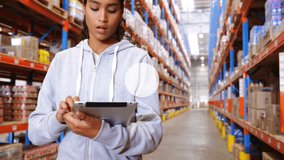 warehouse worker tapping tablet activating network overlay while colleagues verifying stock levels. Inventory, logistics, technology, collaboration, industrial, digital, data - Powered by Shutterstock - Get 15% off with code: PIKWIZARD15