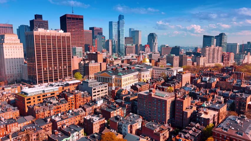Diverse urban landscape of modern Boston, Massachusetts, USA. Skyscrapers of downtown at backdrop. Aerial view.