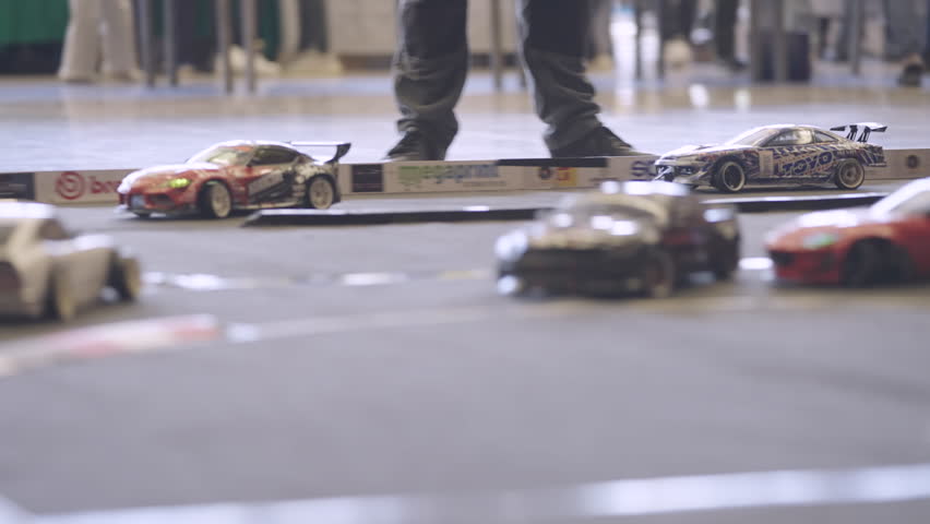 SLOVENIA, LJUBLJANA - 10. MAY 2025: Rc car toy model remote drifting cars racing at Auto Motor Show Ljubljana 4K