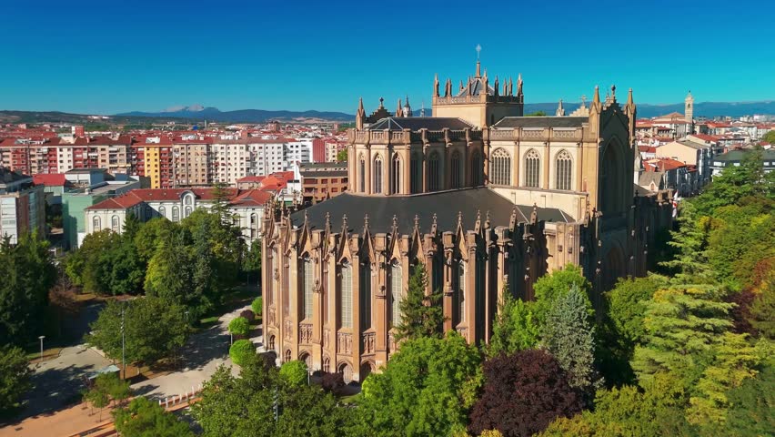 Aerial view of the Cathedral Maria Inmaculada in Vitoria-Gasteiz, Basque Country, Spain. Beautiful New Cathedral building and Vitoria cityscape captured on a sunny summer day