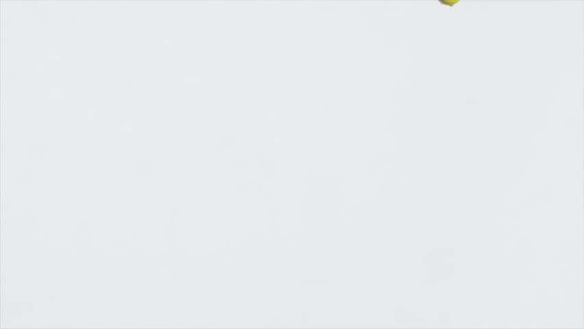 Group of vibrant yellow rubber ducks cascading and gradually accumulating in dynamic, playful motion against pristine white studio background, creating whimsical visual pattern. 3D Illustration