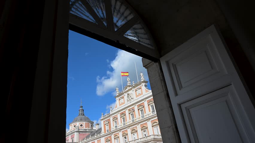 Framed by a doorway on a sunny day, Spain
