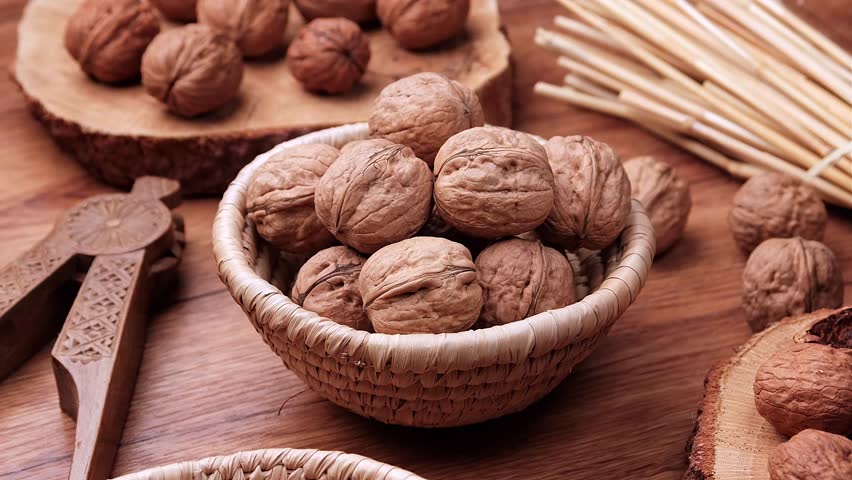pile of walnuts inside the basket - closeup