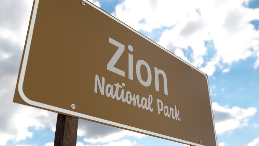 Zion National Park (Utah) Road Sign Against Blue Sky and Clouds. One of The US National Parks Series.