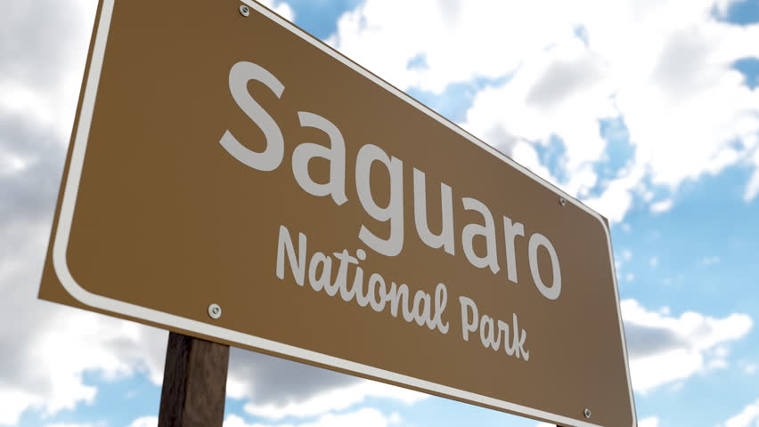 Saguaro National Park (Arizona) Road Sign Against Blue Sky and Clouds. One of The US National Parks Series.