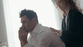 A heartfelt moment of emotional vulnerability and support exchanged between two individuals in a softly lit room - Powered by Shutterstock - Get 15% off with code: PIKWIZARD15