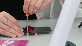 toy factory production assembly and packaging of plastic dolls for children - Powered by Shutterstock - Get 15% off with code: PIKWIZARD15