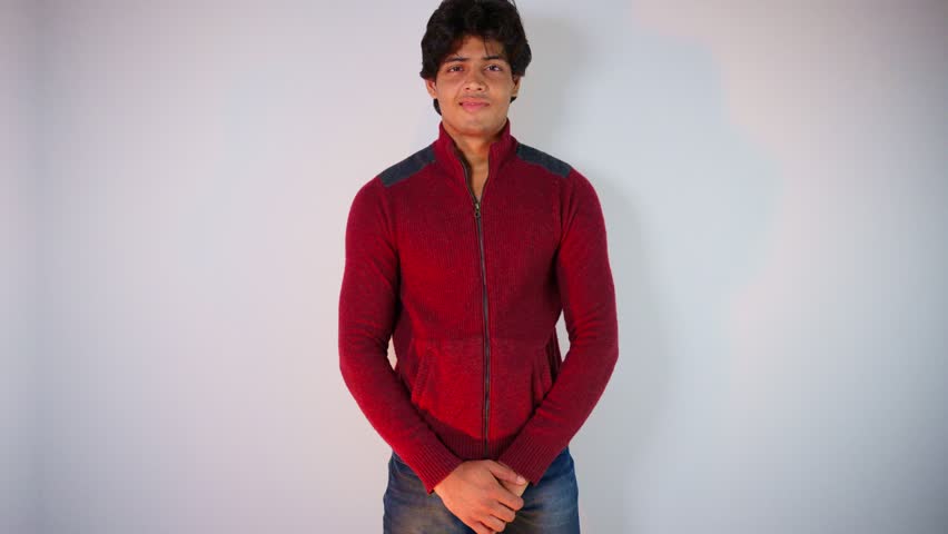Young man introduces himself with confidently, Bold guy shares his story in a clear tone, Focused male declares own identity proudly, Smart model gives details by direct eye contact, Stylish Speaker