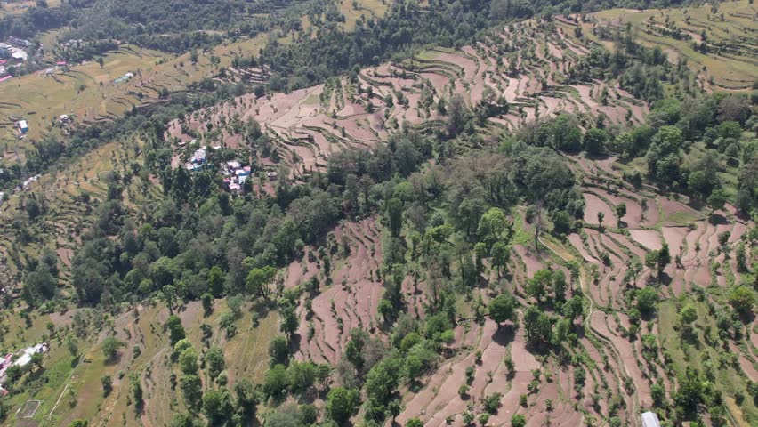 Mountain Farming – Scenic View of Terraced Fields, Rural Agriculture, and Traditional Farming Practices in the Hills with Natural Landscape and Sustainable Living	
