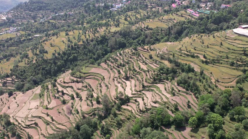 Mountain Farming – Scenic View of Terraced Fields, Rural Agriculture, and Traditional Farming Practices in the Hills with Natural Landscape and Sustainable Living	
