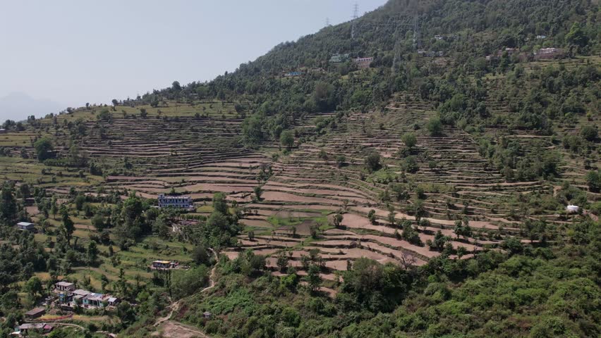 Mountain Farming – Scenic View of Terraced Fields, Rural Agriculture, and Traditional Farming Practices in the Hills with Natural Landscape and Sustainable Living	
