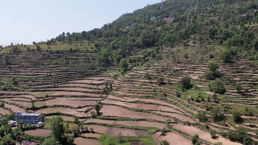 Mountain Farming – Scenic View of Terraced Fields, Rural Agriculture, and Traditional Farming Practices in the Hills with Natural Landscape and Sustainable Living	
