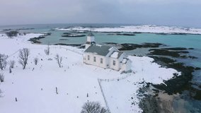 Gimsoy Church, Norway, Europe. Wonderful winter scene of Lofoten Islands. Picturesque morning seascape of Norwegian sea. Life over polar circle. - Powered by Shutterstock - Get 15% off with code: PIKWIZARD15
