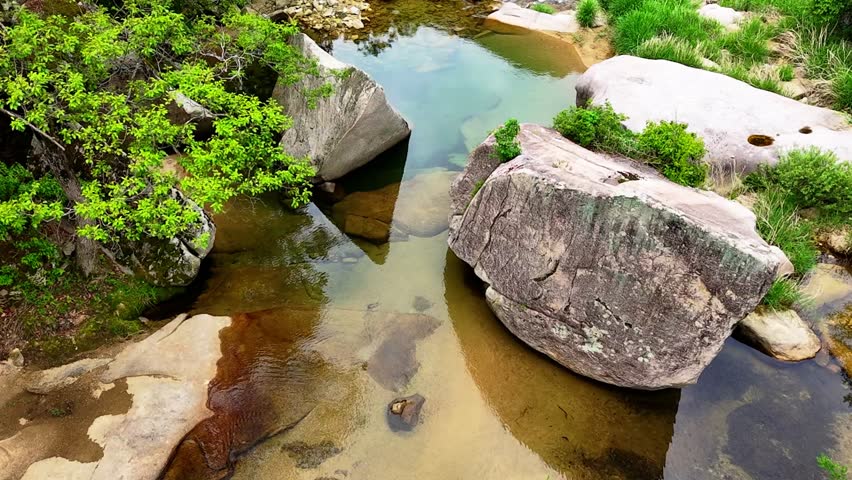 Aerial Drone Footage of a Clear Mountain Stream Flowing Through Mungyeong Countryside in Late Spring and Early Summer, Korea