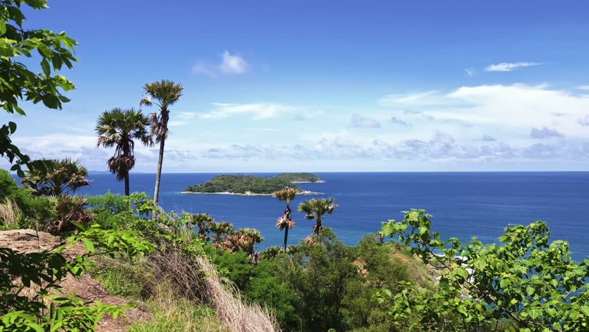 Picturesque small island located in the middle of the vast ocean surrounded by blue waters