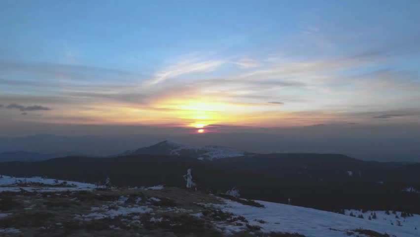 Majestic Sunrise Over Mountain Range from Summit Viewpoint