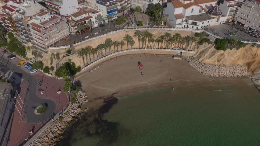 Benidorm city at Costa Blanca in Spain, Aerial Drone Shot. Skyscrappers along the Beach on Sea Shore, Playa de Levante.