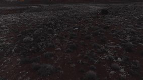 Rocky Terrain at Sunset, Desert Landscape, Dark Stones, Reddish Soil - Powered by Shutterstock - Get 15% off with code: PIKWIZARD15