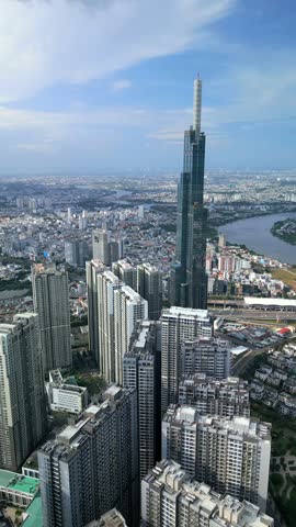 Aerial view of high-rise buildings and the skyline in Ho Chi Minh City, Vietnam. Ideal for real estate, finance, architecture, and development themes.