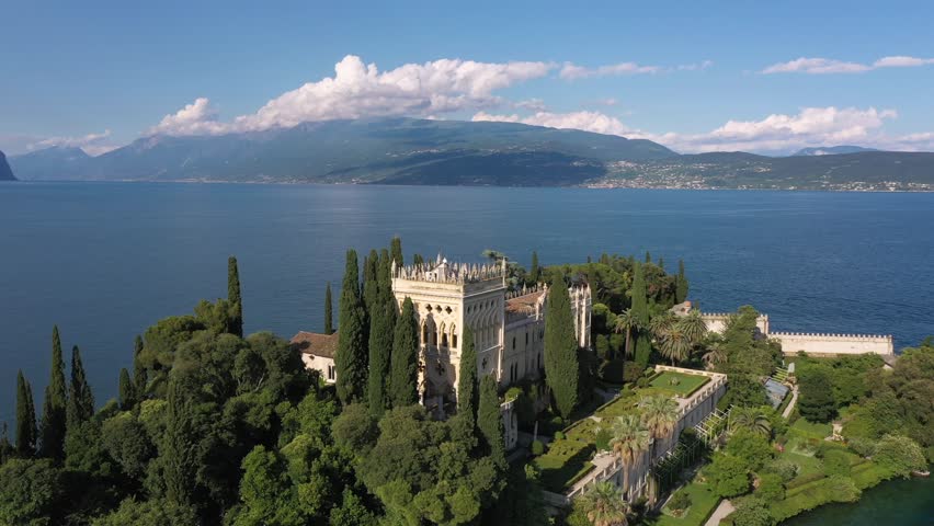 Aerial view of Isola del Garda, Lake Garda, Italy. Visit the historic villa on Isola del Garda, a family estate featuring ancient walls, Mediterranean plants, and cultural tours.