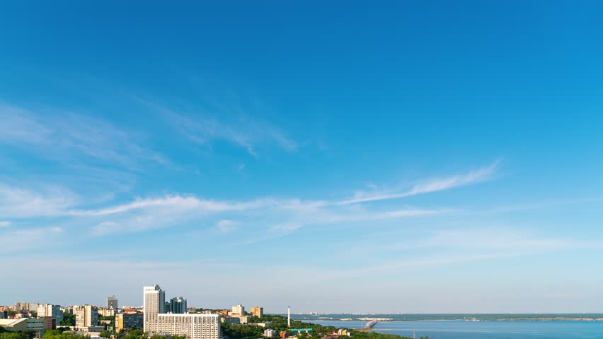 Ulyanovsk, Russia. Nightfall after sunset. After the night the sun rises. In the morning It rains. Panorama of the city. View of the Volga River, TimeLapse