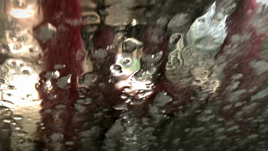 Self-Serve Car Wash: Red Soap and Suds Perspective