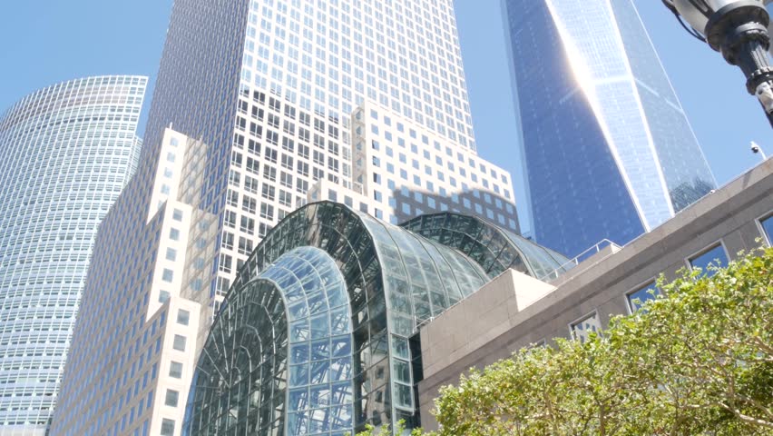 New York City Manhattan, Downtown Financial District architecture, United States. One World Trade Center skyscraper building, USA. American urban street. Freedom tower in NYC. Battery park. Brookfield