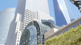 New York City Manhattan, Downtown Financial District architecture, United States. One World Trade Center skyscraper building, USA. American urban street. Freedom tower in NYC. Battery park. Brookfield - Powered by Shutterstock - Get 15% off with code: PIKWIZARD15