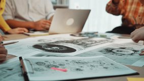 A dynamic scene depicting a collaborative office environment where professionals engage in project planning and strategy development using documents and tools. SACTR - Powered by Shutterstock - Get 15% off with code: PIKWIZARD15