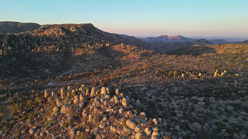Majestic rock formations in golden light, Valle de los Monjes, Creel, Chihuahua, Mexico