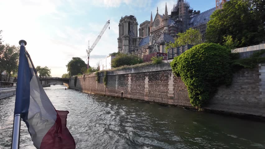 river cruise on the River Seine, Notre Dame Cathedral still under exterior repair