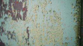 Texture of peeling paint on a metal wall. Close-up of a metal surface with old peeling paint - Powered by Shutterstock - Get 15% off with code: PIKWIZARD15