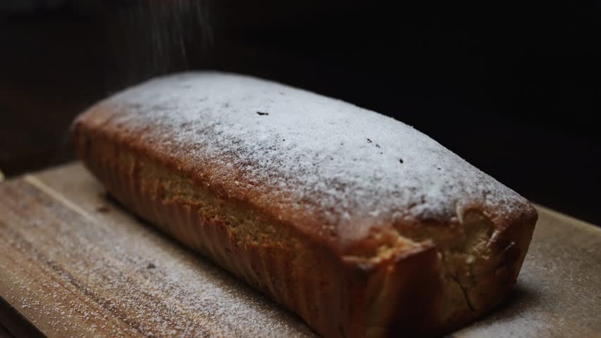 Large Loaf Cake Dusted with Powdered Sugar.