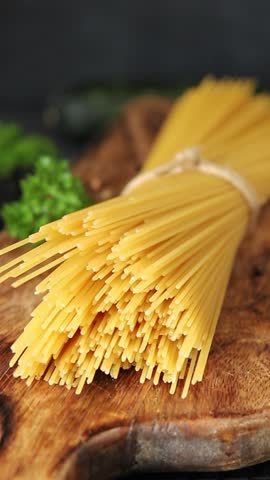 Spaghetti raw pasta food durum wheat ingredient fresh dish on the table rustic food top view copy space food background