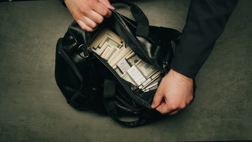 Banknotes and bag counter, Specialised police officer Counting dollar euro banknotes in crime lab with machine, cashed out criminal money, bitcoin changing, buying home flat in bank. 
