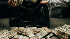 Banknotes and bag counter, Specialised police officer Counting dollar euro banknotes in crime lab with machine, cashed out criminal money, bitcoin changing, buying home flat in bank.  - Powered by Shutterstock - Get 15% off with code: PIKWIZARD15