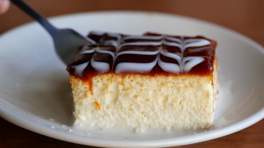 A slice of tres leches cake