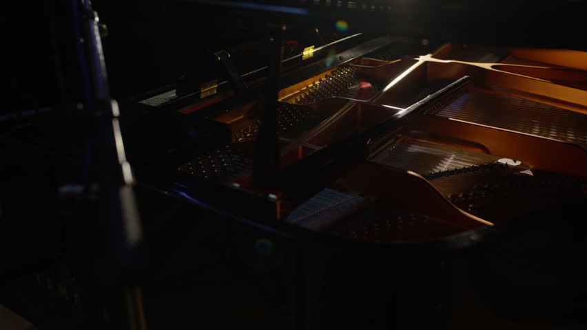 Inside of a grand Piano in slow motion