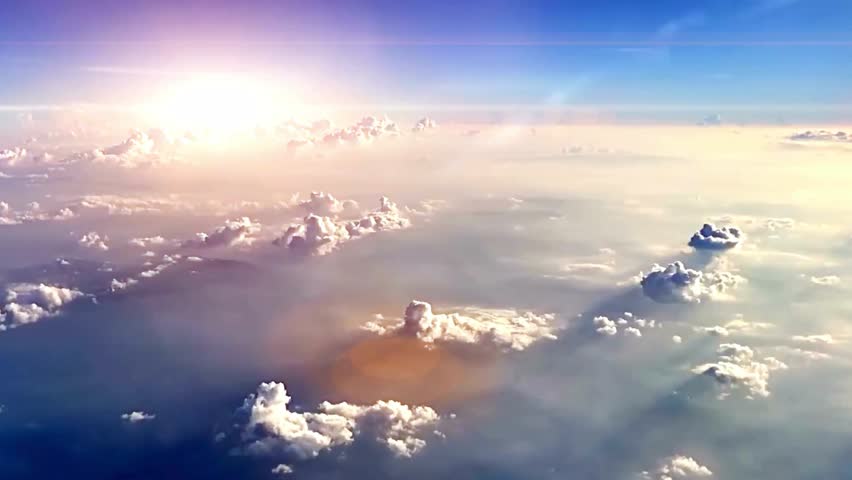 Aerial View of Cloudscape at Sunrise, High Altitude Perspective