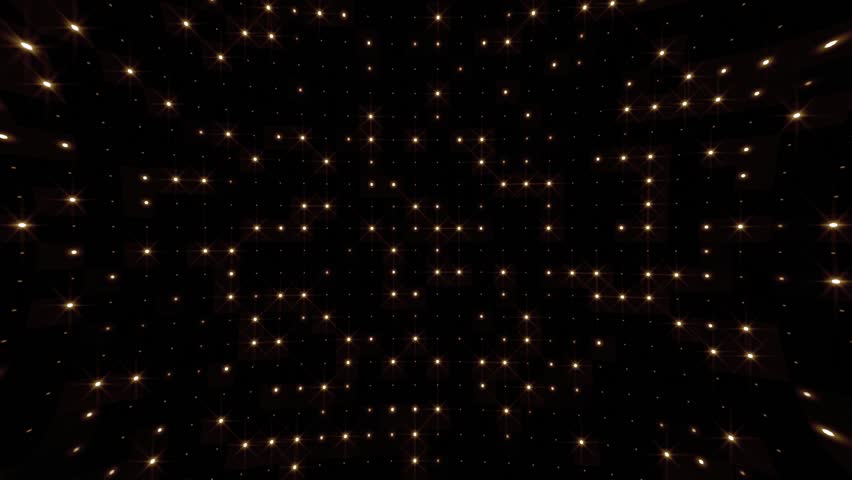 LED lights background with a grid of twinkling warm golden lights. Blinking stage lights animation. This performance background is full HD and looping.